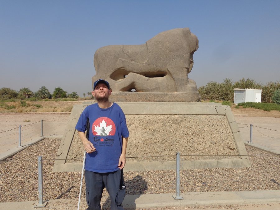 Tony in front of the Lion of Babylon. This large stone lion dates from around 1595 BC. It is carved from a solid block of black basalt and is two metres in length and one metre in height. The lion weighs around 7000 kg. The lion is situated on top of a modern rectangular concrete pedestal. The lion is in a standing pose with what appears to be a human figure lying beneath it. The lion was found in the ancient city of Babylon. It was first documented in 1817 by Claudius Rich, although it may have been seen as early as 1790 by Joseph de Beauchamp.