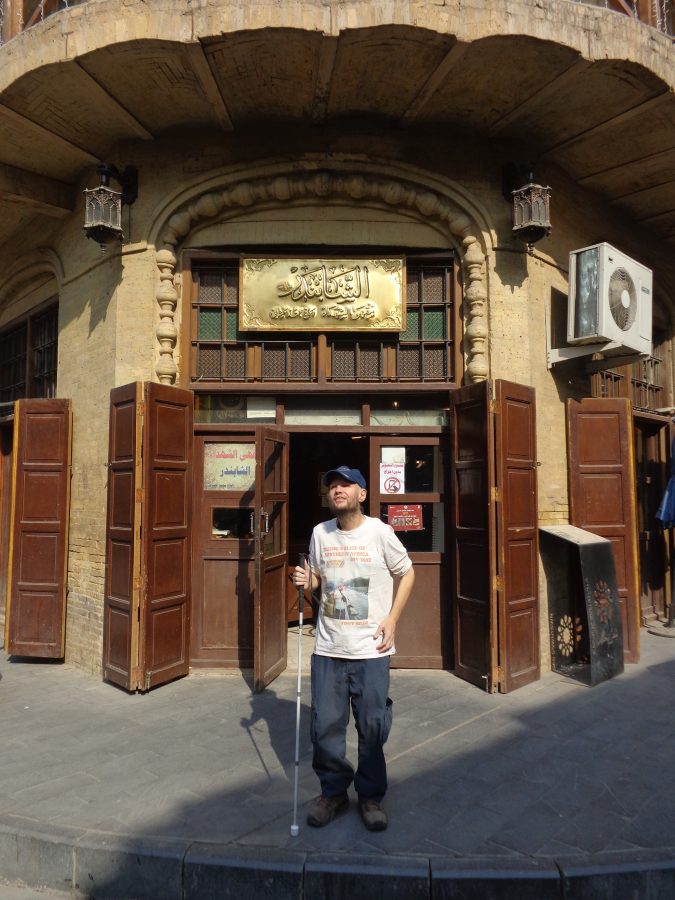 Tony again in front of the Shabandar Café. The building adjoins two streets with the entrance on the corner.
