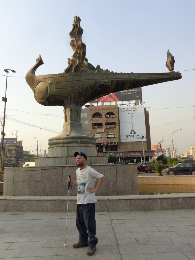 Another view of Tony in front of the Magic Lantern (Al Fanous El Sehri) sculpture by Iraqi sculptor Mohammed Ghani Hikmat.
